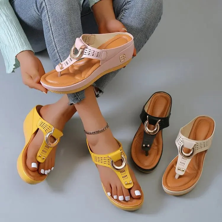 Comfortable open toe beach sandals in yellow, pink, black, and white with decorative rings and cushioned soles
