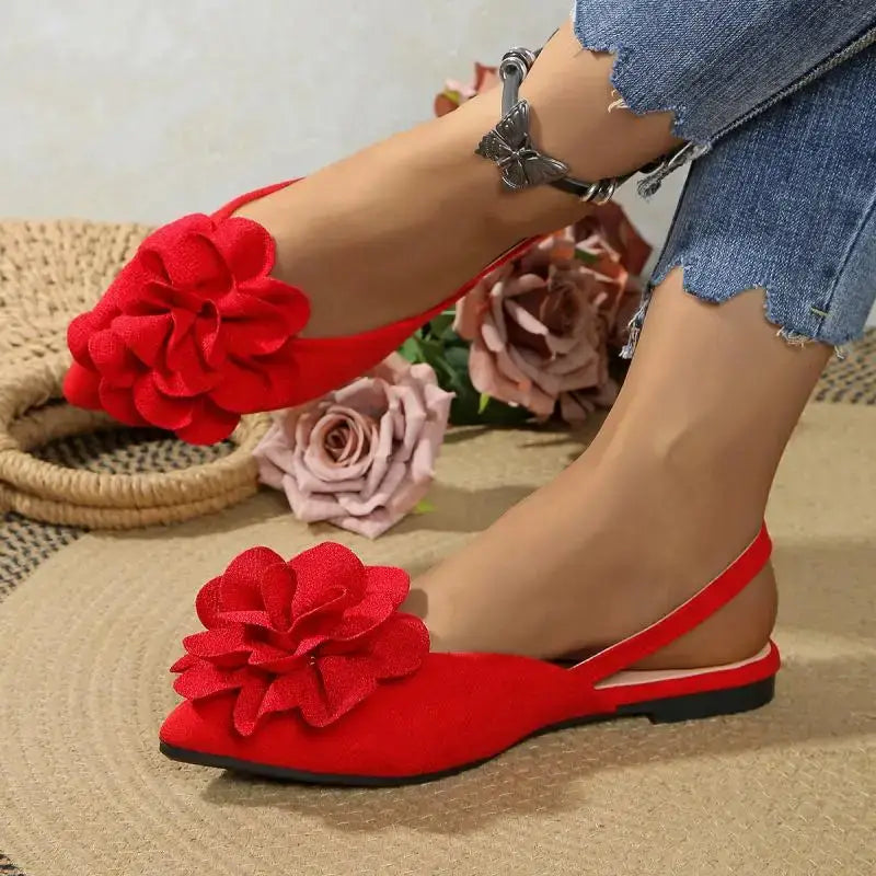 Red flat heel sandals with floral detail from The Lady's Haven Boutique comfortable pointed toe summer shoes