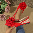 Red flat heel sandals with large flower decoration comfortable pointed toe summer shoes from The Lady's Haven Boutique