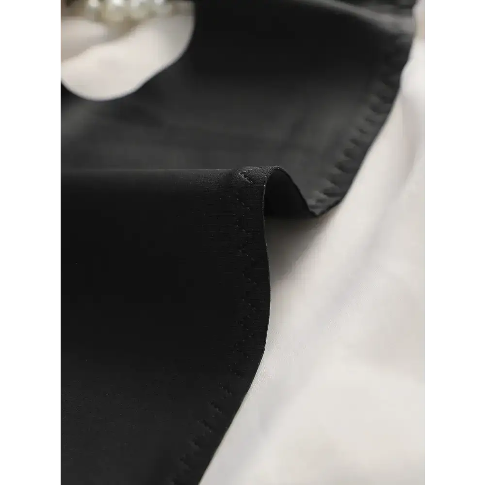 Close-up of a black comfortable steel ring bra for women showing smooth fabric and fine stitching