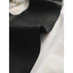 Close-up of a black comfortable steel ring bra for women showing smooth fabric and fine stitching