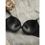 Black comfortable steel ring lingerie for women bra with smooth cups on soft gray fur background