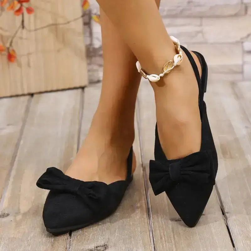 Black flat heel sandals from The Lady's Haven Boutique comfortable summer pointed toe shoes with bow detail