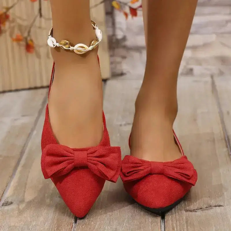 Red flat heel sandals with bows from The Lady's Haven Boutique, comfortable summer pointed toe shoes