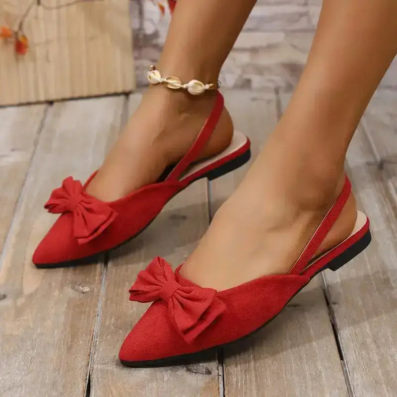 Red flat heel sandals with bow detail from The Lady's Haven Boutique comfortable summer pointed toe shoes