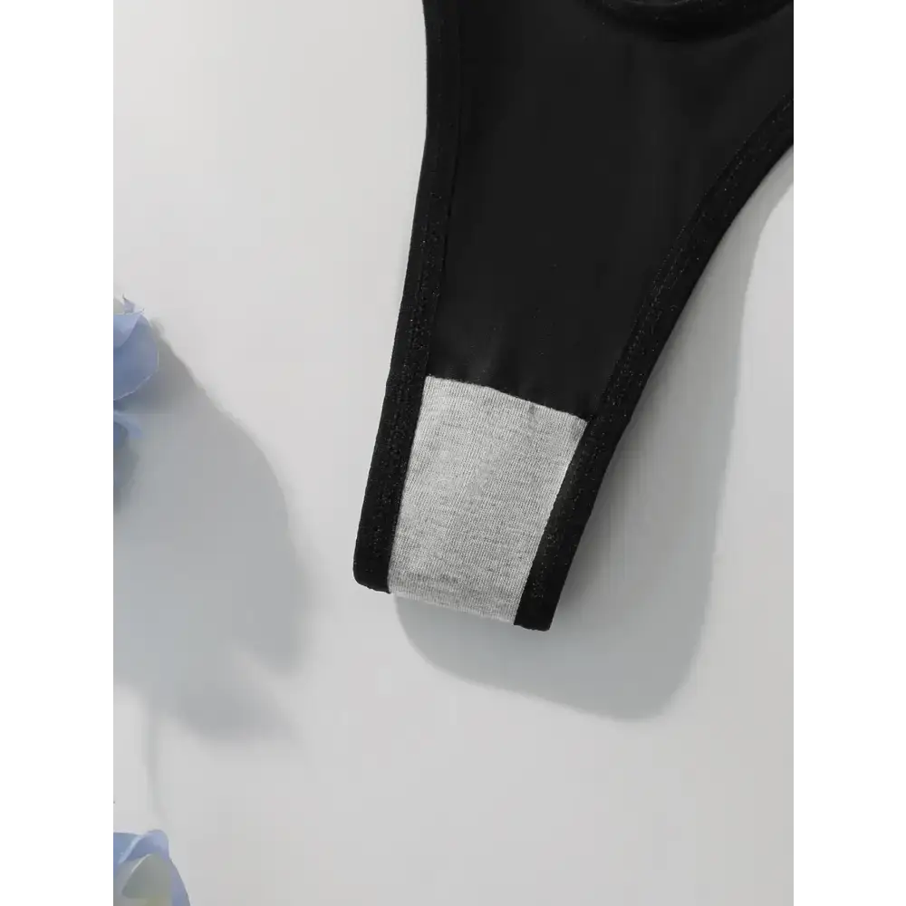Close-up of black thong underwear showing soft inner lining from comfortable thong pack by The Lady's Haven Boutique