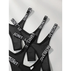 Black comfortable thong pack with white logo elastic straps from The Lady's Haven Boutique