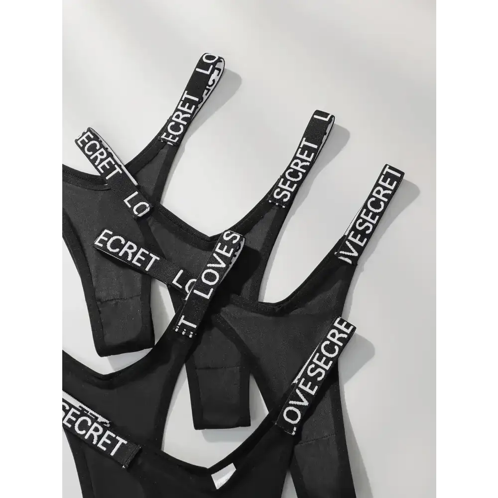 Black comfortable thong pack with white logo elastic straps from The Lady's Haven Boutique