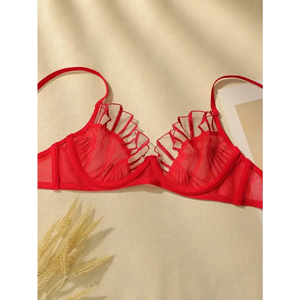Red comfortable underwire bra and panty set with sheer fabric and ruffle details from The Lady's Haven Boutique