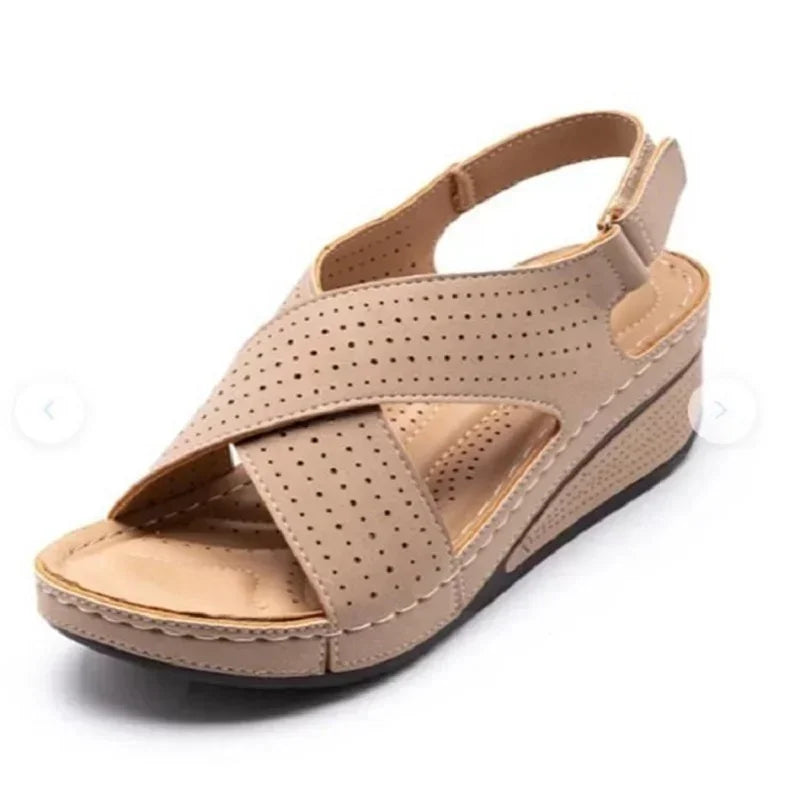 Beige comfortable walking sandals for ladies with perforated straps and wedge heel from The Lady's Haven Boutique