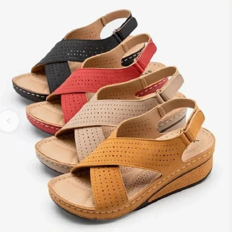 Comfortable walking sandals for ladies in black red beige and tan with perforated straps and cushioned soles