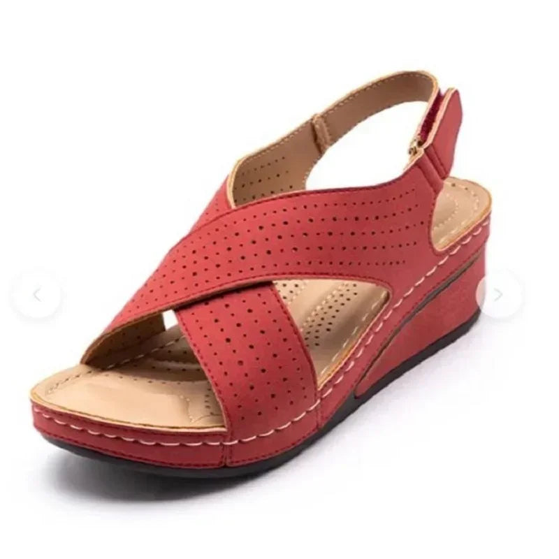 Red comfortable walking sandals for ladies with wedge heel and perforated straps