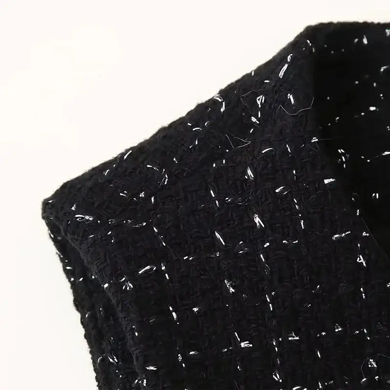 Close-up of black textured fabric detail for cropped vest and high waist shorts set by The Lady's Haven Boutique