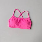 Bright pink cross back sports bra with comfortable straps for active women