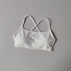 White cross back sports bra from The Lady's Haven Boutique with comfortable and stylish design