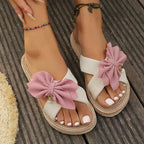 The Lady's Haven Boutique flat heel sandals with pink bow and cross strap comfort sandals design