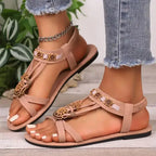 The Lady's Haven Boutique beige flat heel cross strap soft sole sandals with floral decorations
