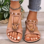The Lady's Haven Boutique cross strap soft sole sandals flat heel with floral and chain details