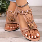 The Lady's Haven Boutique cross strap soft sole sandals in beige with floral embellishments and flat heel