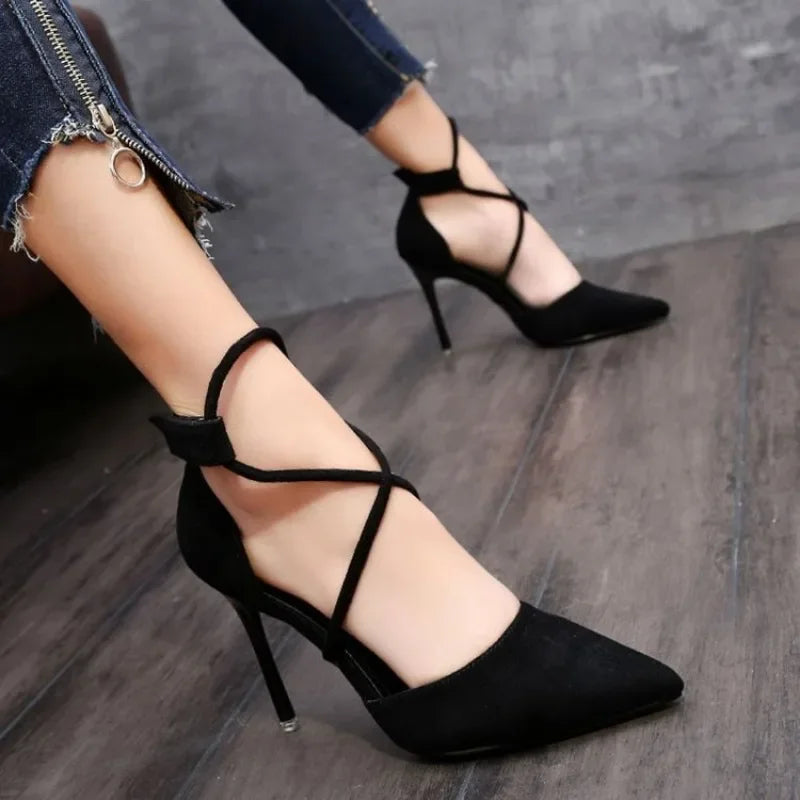 Black cross strap suede high heels with pointed toe and stiletto heel from The Lady's Haven Boutique