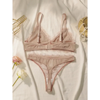 Delicate lace intimate set for ladies in soft blush pink with adjustable straps and floral lace trim