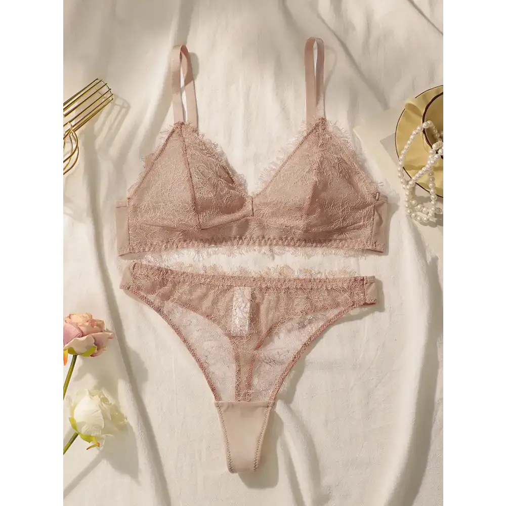 Delicate lace intimate set for ladies in soft nude color with intricate floral lace design