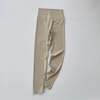 Beige elastic fitness leggings for women with a high waistband for comfort during workouts