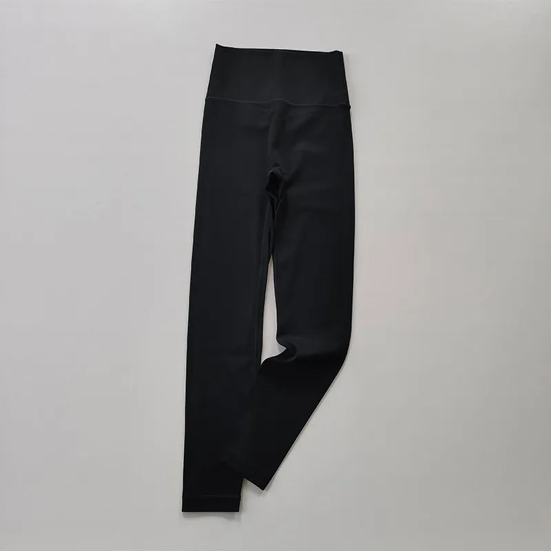 Black elastic fitness leggings for women with high waistband for comfort and flexibility