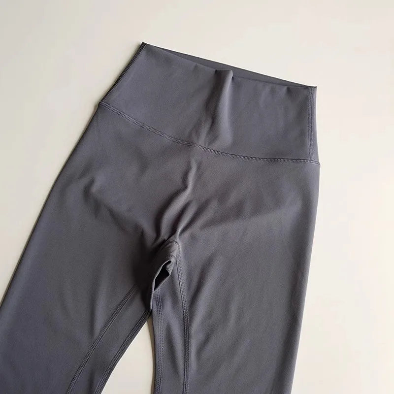 Gray high-waisted elastic fitness leggings for women designed for comfort and flexibility during workouts