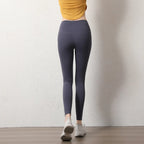 High-waisted gray elastic fitness leggings for women, perfect for workouts and comfortable wear