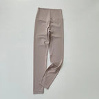 Soft beige elastic fitness leggings for women with a high waistband for comfort and support