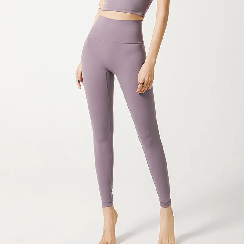 Stylish purple elastic fitness leggings for women with high waist and comfortable fit