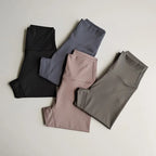 Set of three elastic fitness leggings for women in black, gray, and pink perfect for workouts