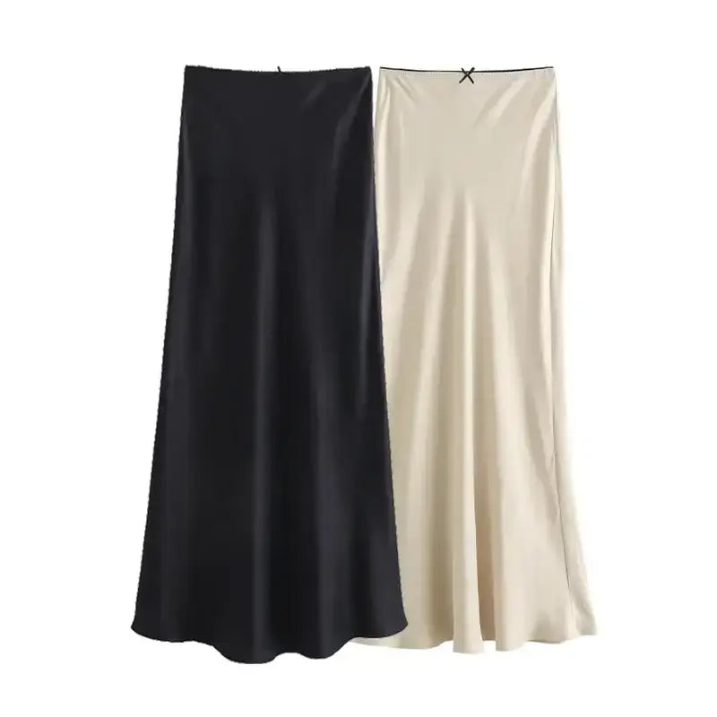Black and ivory ladies evening skirt pair with a smooth, flowing design from The Lady's Haven Boutique