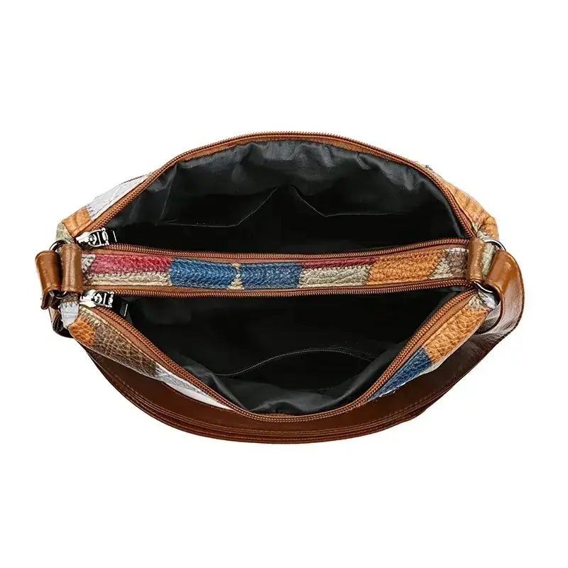 Inside view of a vintage crossbody bag for women with spacious compartments and stylish design