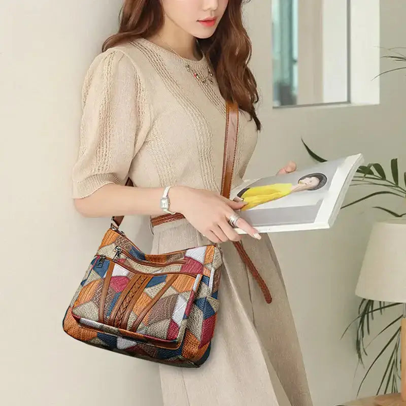 Stylish vintage crossbody bag for women with a colorful patchwork design, perfect for casual outings