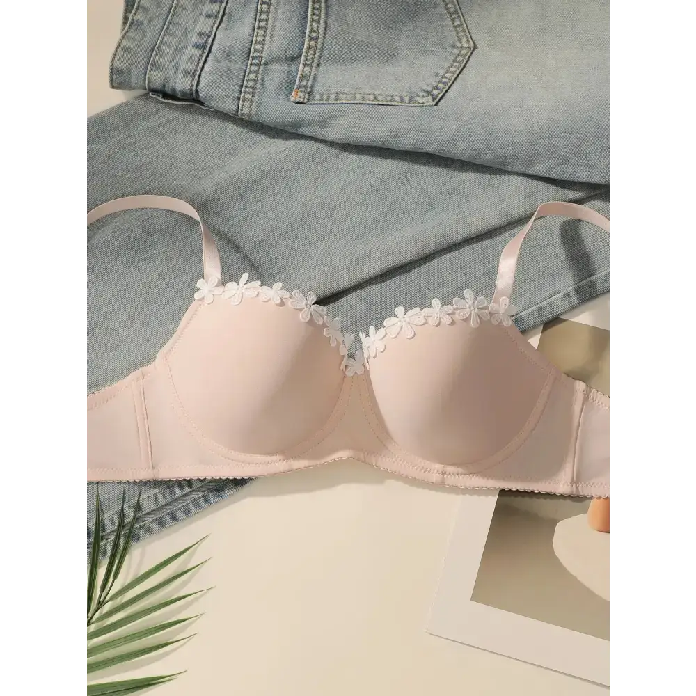 Light pink embroidered floral underwear set bra with delicate flower details on straps
