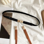 Stylish black fashion belt for dresses with a sleek gold buckle design