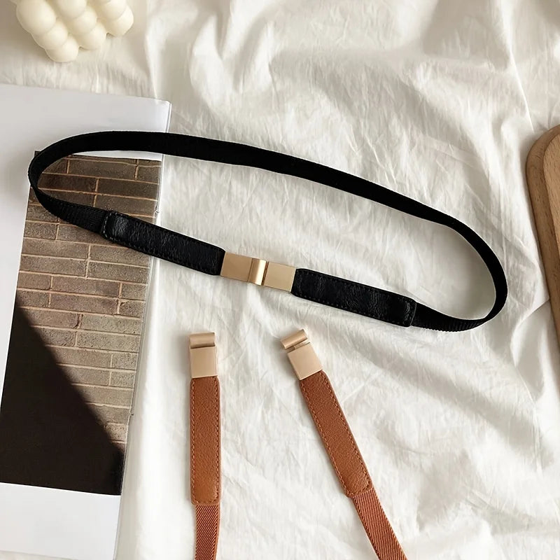 Stylish black fashion belt for dresses with a sleek gold buckle design