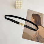 Elegant black fashion belt for dresses with a stylish gold clasp for a chic look