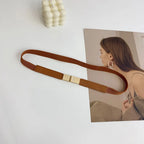 Stylish brown fashion belt for dresses with a sleek gold buckle, perfect for enhancing your outfit
