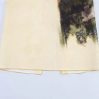 Beige skirt featuring artistic floral print design from The Lady's Haven Boutique fashion casual skirts with print