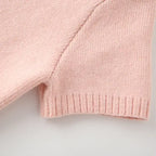Close up of soft pink knit fabric on fashion lightweight cardigan from The Lady's Haven Boutique