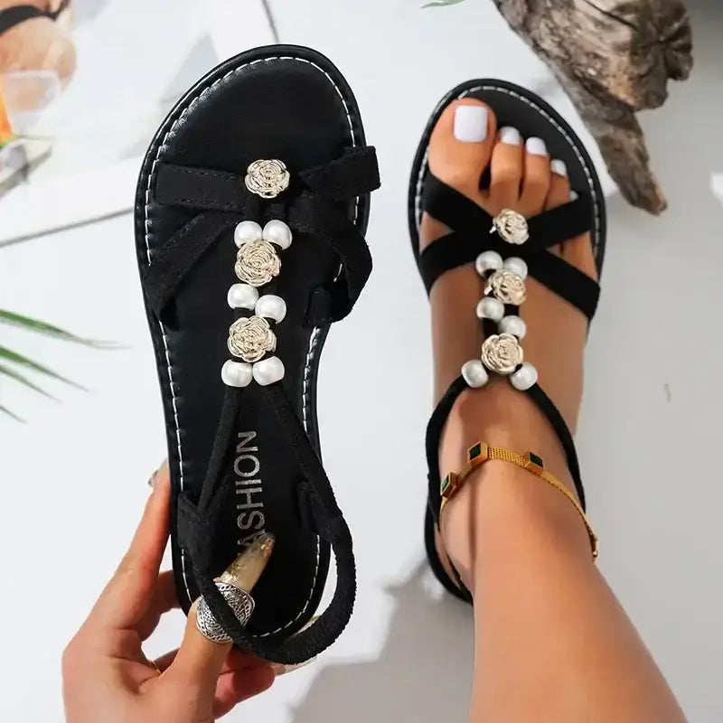 Black flat heel non slip flower decor sandals with pearl and flower embellishments from The Lady's Haven Boutique