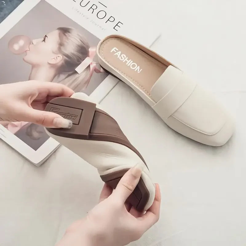 Soft beige zapatos mujer casual slip-on flats with flexible sole held by hands