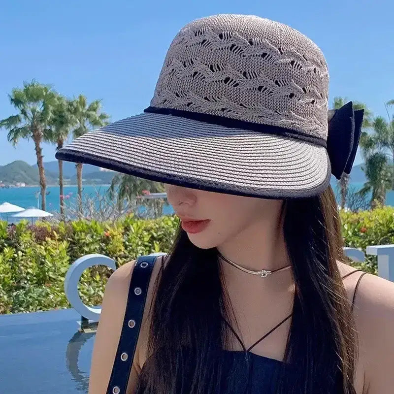 Elegant wide-brimmed hat from The Lady's Haven Boutique, ideal fashionable straw hats for women