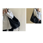 Stylish female casual tote purse in black made for everyday use and easy carrying