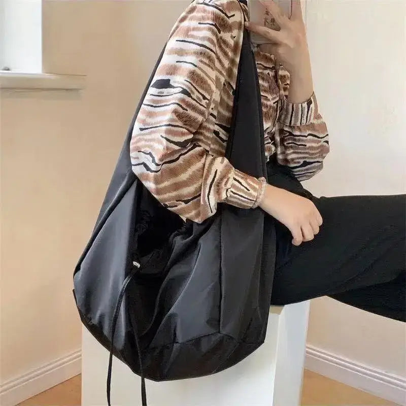 Stylish black female casual tote purse perfect for everyday use and versatile outfits