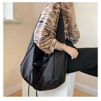 Stylish black female casual tote purse perfect for everyday use and easy to carry