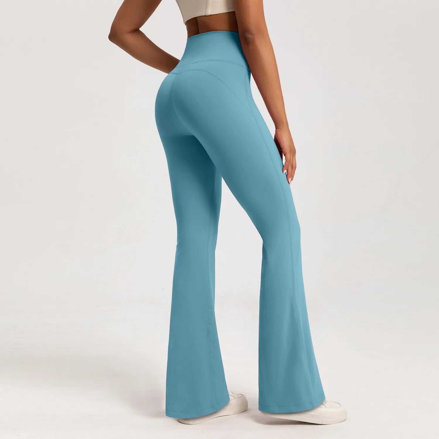 Female high waist yoga leggings in light blue with a flattering fit for activewear and comfortable workouts